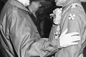 Gen. Douglas MacArthur, commander in chief, United Nations forces in Korea (at left), is greeted by Lt. Gen. Matthew B. Ridgeway at Kangnung, Korea on April 3, 1951. 