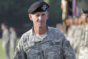 Gen. Stanley McChrystal reviews troops for the last time as he is honored at a retirement ceremony at Fort McNair in Washington, July 23, 2010.