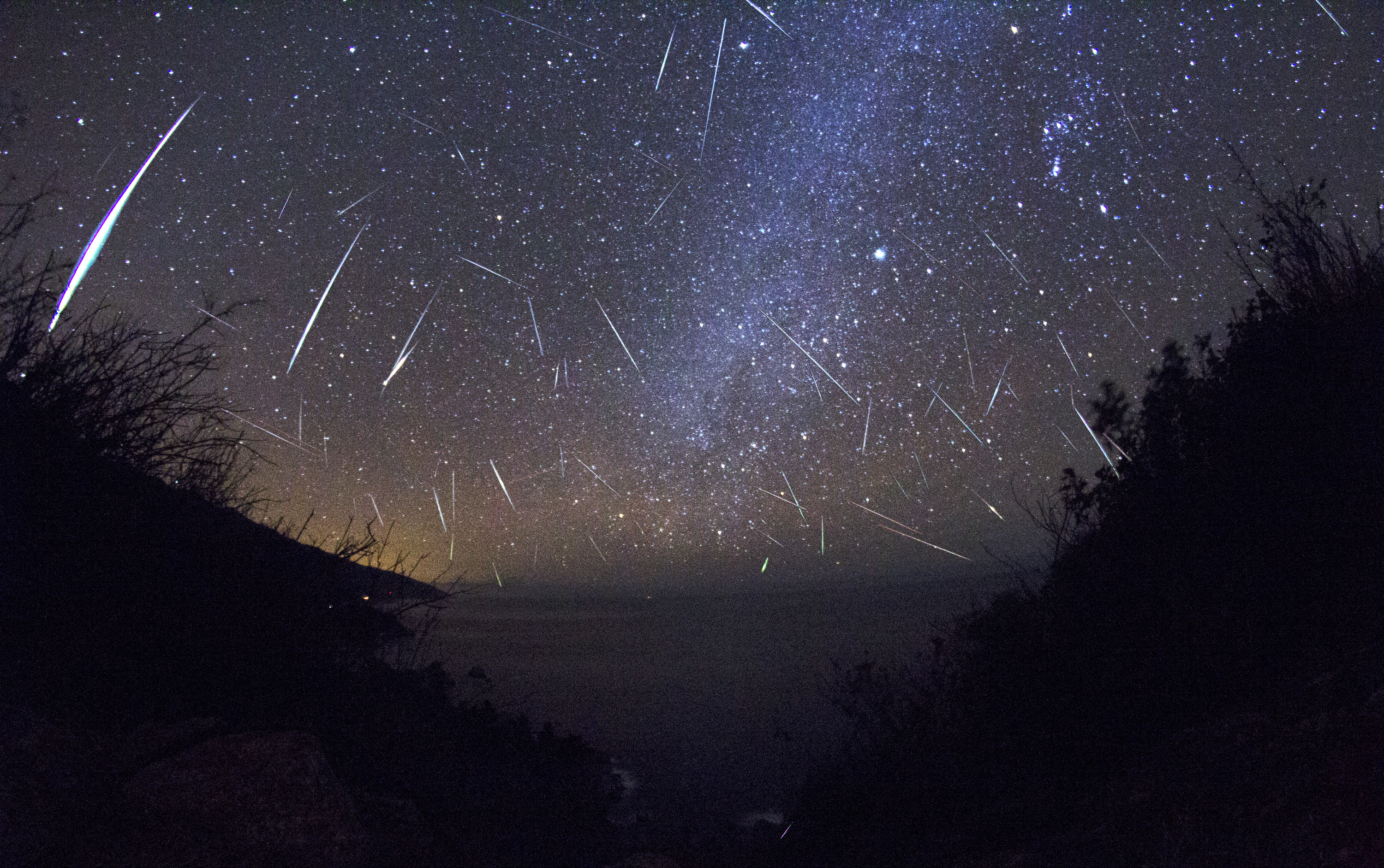 Skywatcher Kenneth Brandon wrote, This shot is a composite of about 700 frames from a time-lapse I took in Big Sur, CA.  I found 61 frames with meteors in them. Then I stacked the frames and created masks for each meteor.  The image was taken Dec. 13, 2012.