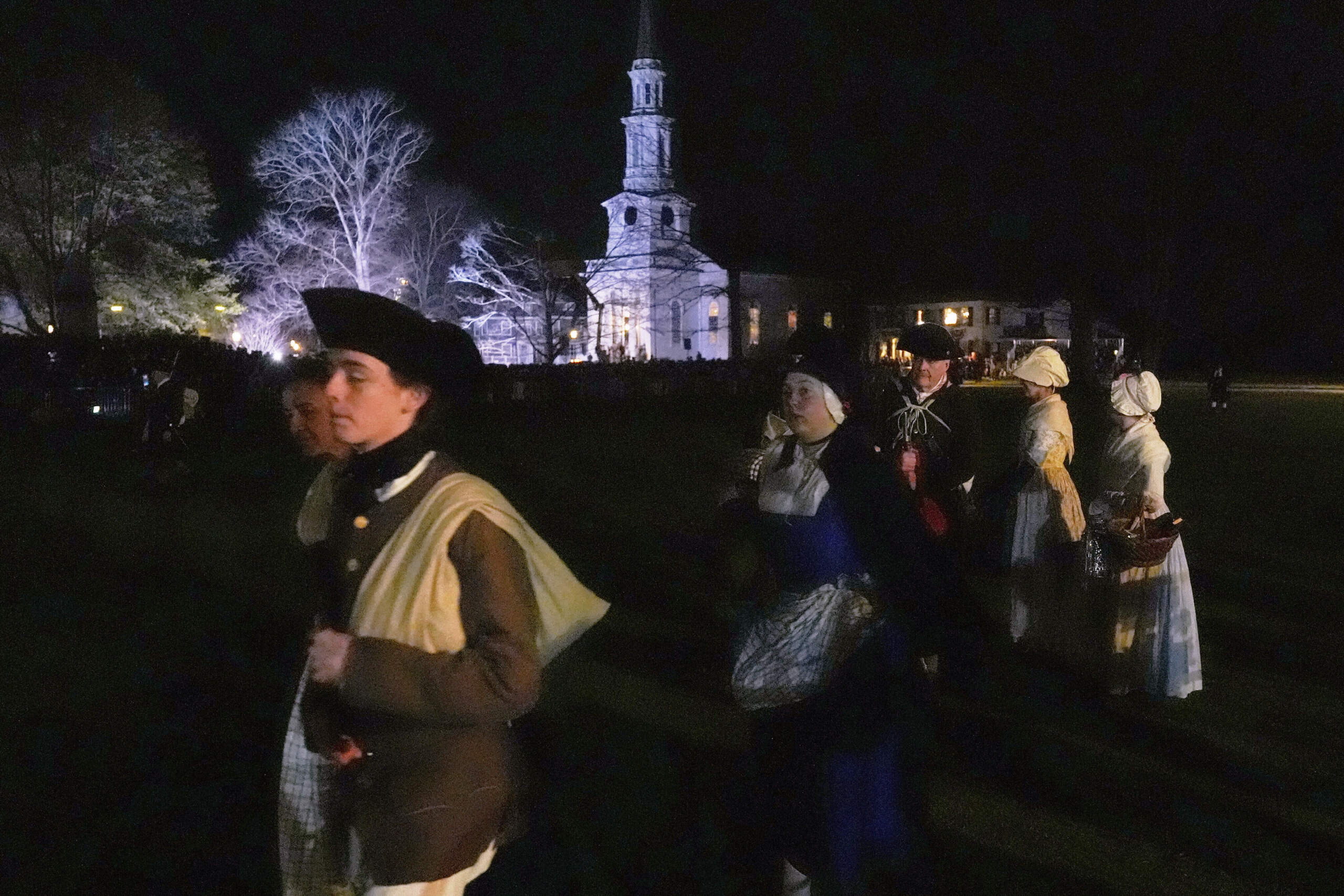 Colonials gather prior to facing the British Regulars. (Charles Krupa/AP)