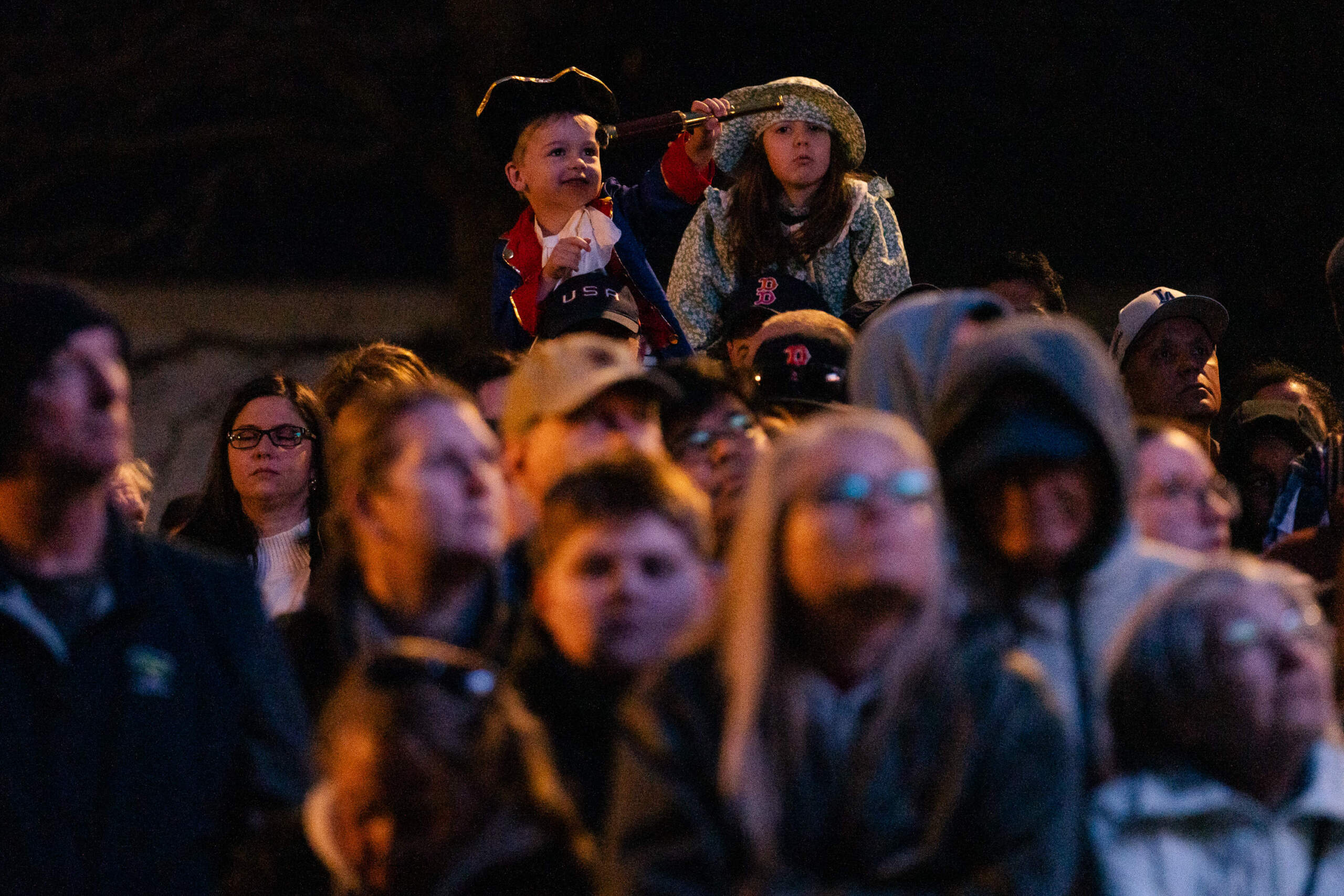 Children dressed in colonial outfits are seen at the 250th reenactment of the Battle of Lexington. (Sophie Park/Getty Images)