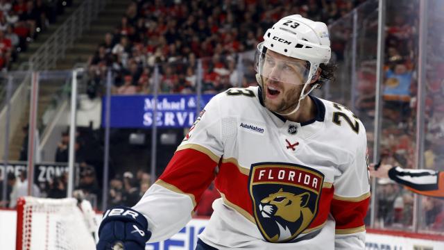 Florida Panthers' Carter Verhaeghe (23) celebrates his goal against the Carolina Hurricanes during first period of Game 1 of the NHL hockey Stanley Cup Eastern Conference finals in Raleigh, N.C., Tuesday, May 20, 2025. (AP Photo/Karl DeBlaker) Panthers_Hurricanes_Hockey_26464