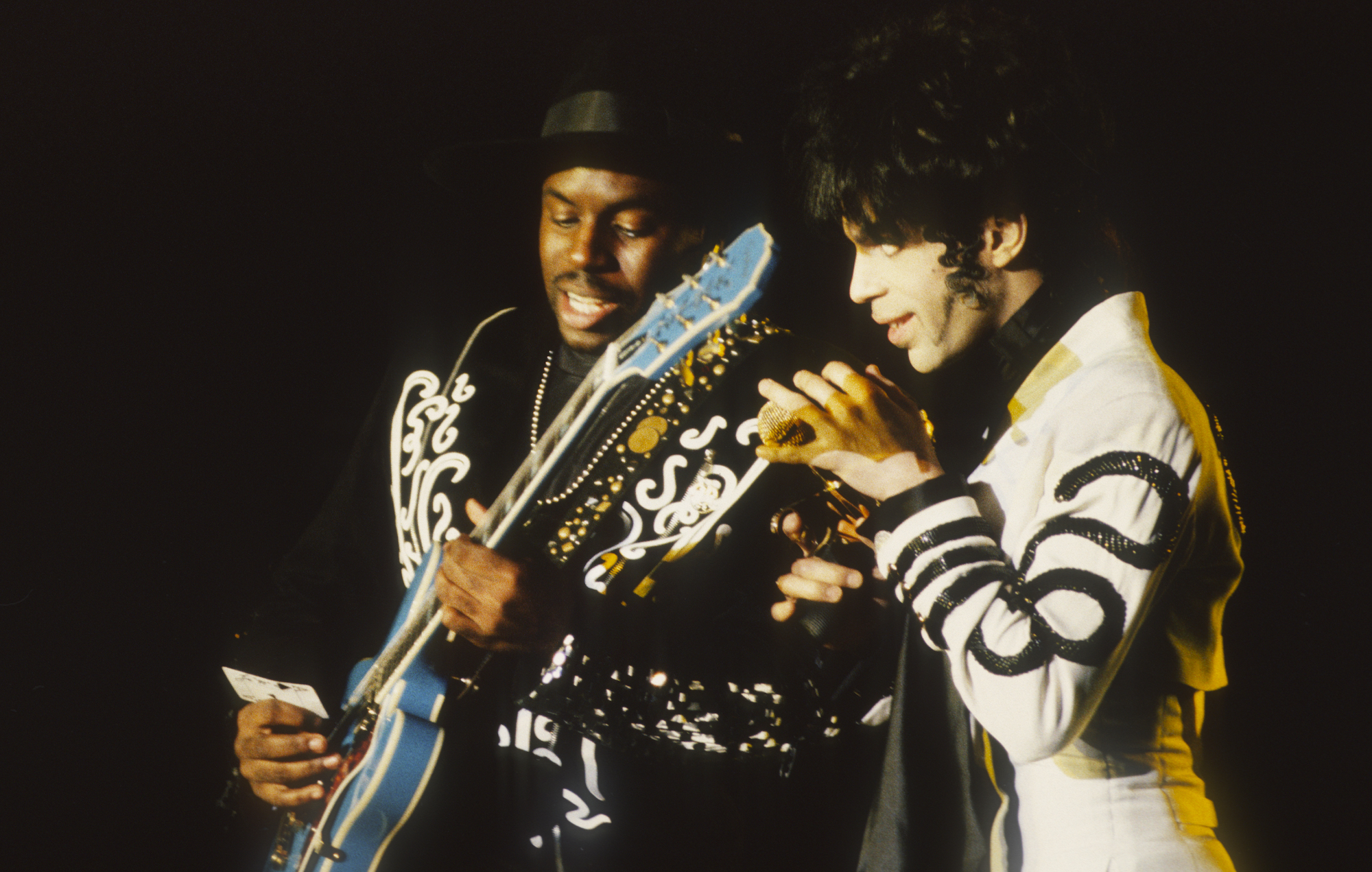 Levi Seacer Jr. (left) and Prince perform onstage at the Flanders Expo in Ghent, Belgium on April 9, 1993