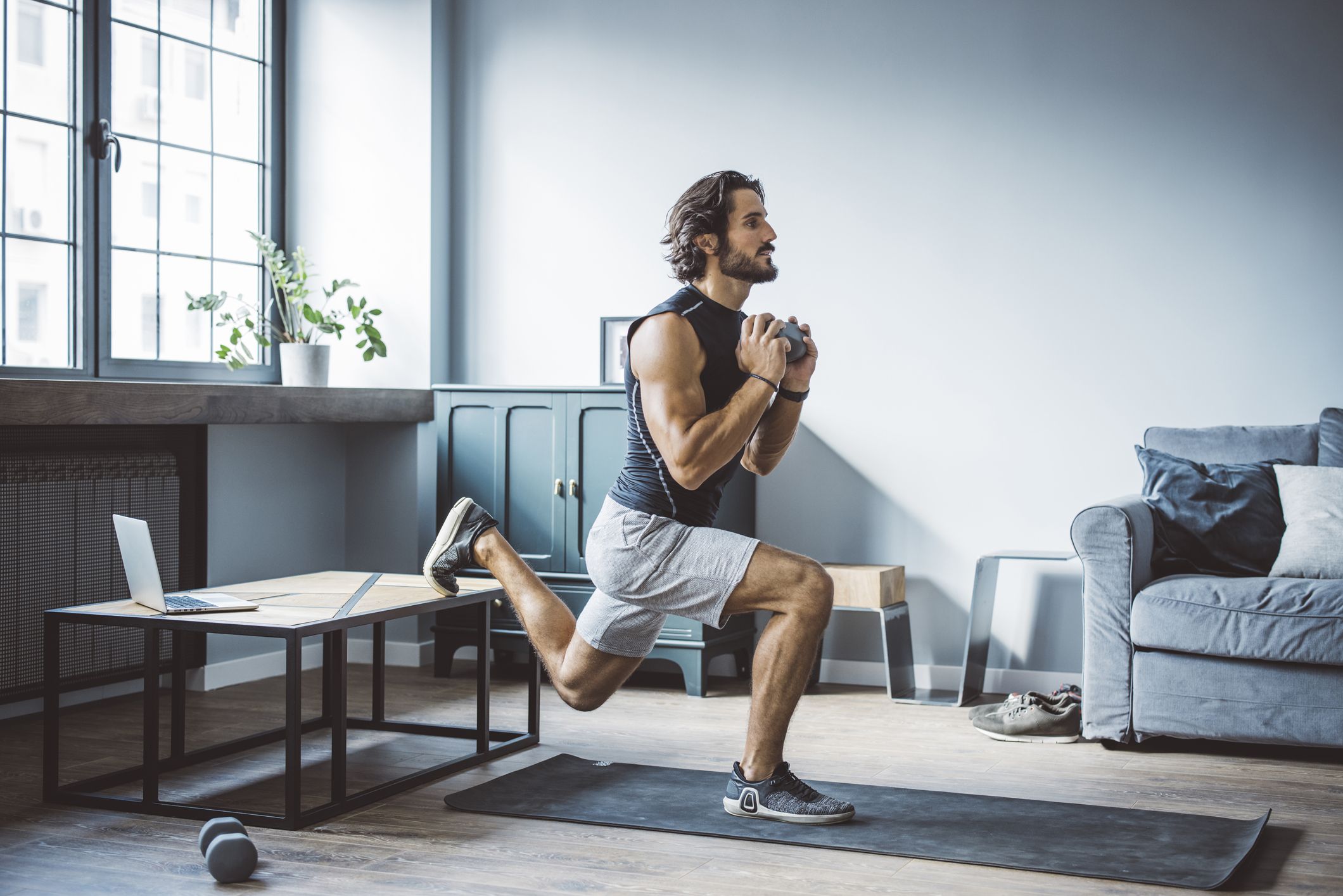 young men exercising at home