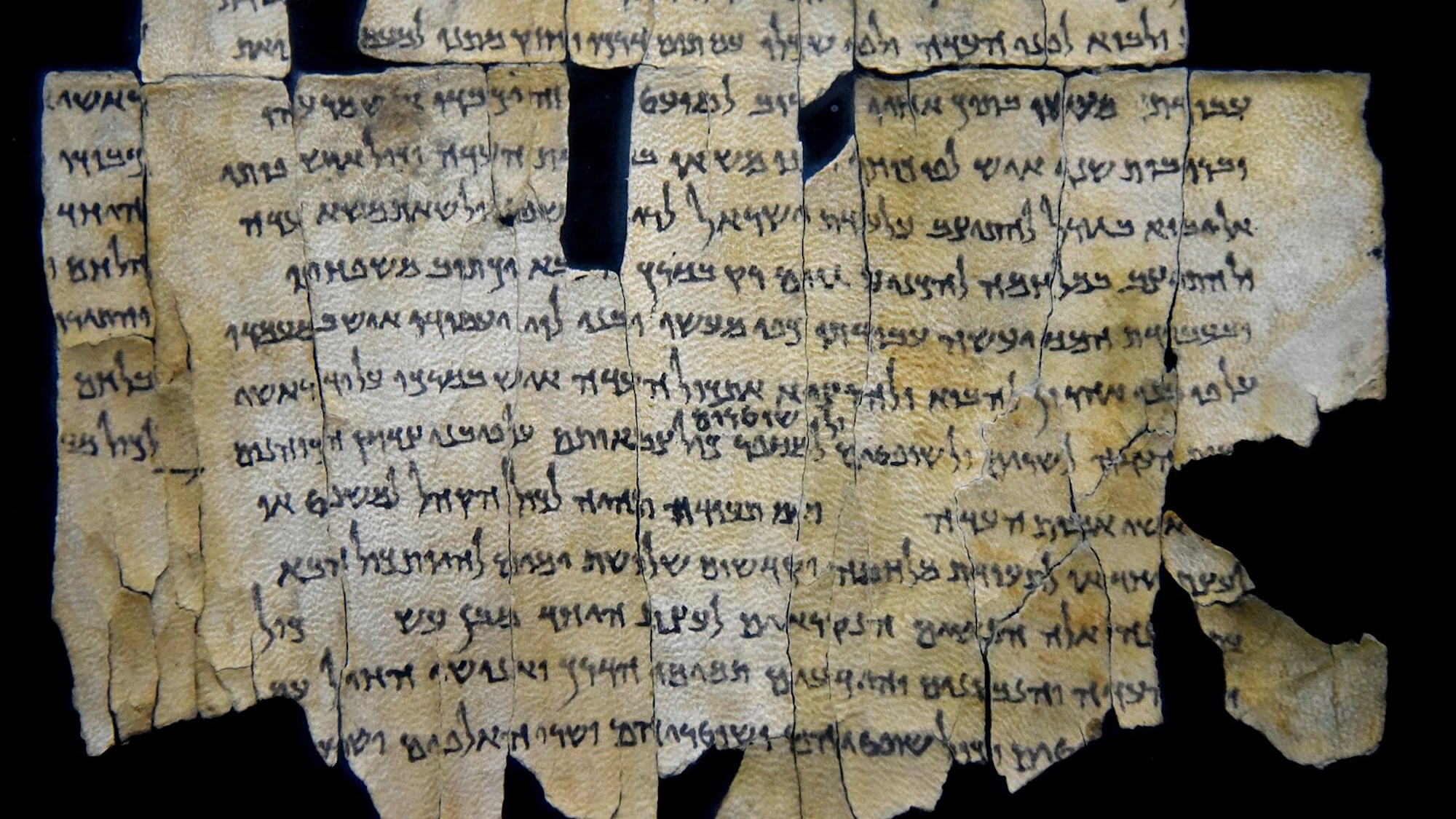 Part of Dead Sea Scroll number 28a (1Q28a) from Qumran Cave 1. From Qumran (Khirbet Qumran or Wadi Qumran), West Bank of the Jordan River, near the Dead Sea, modern-day State of Israel. The Jordan Museum, Amman, Jordan Hashimite Kingdom.