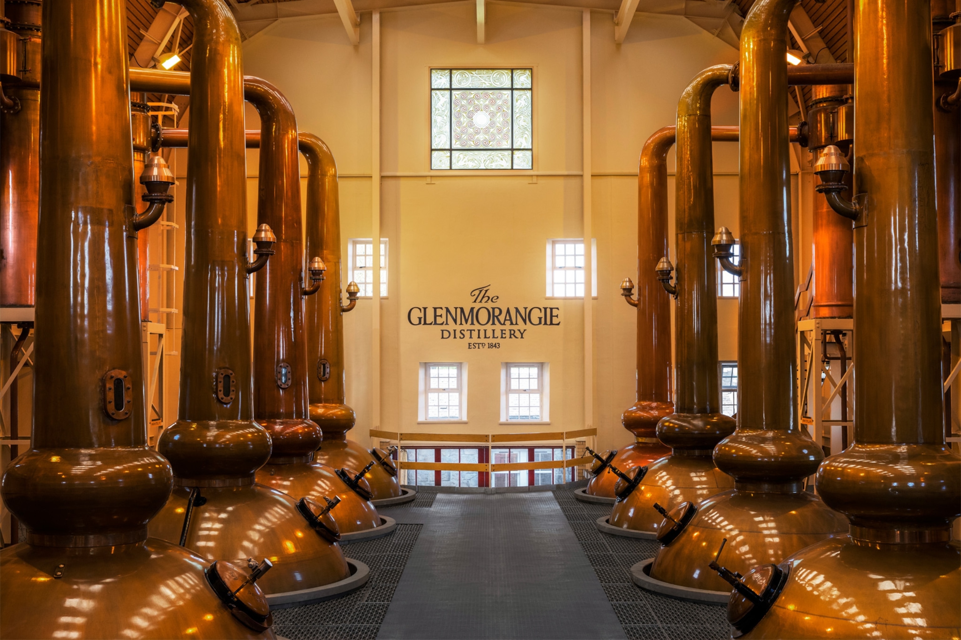 a shot of the stills at Glenmorangie Distillery in the Scottish Highlands