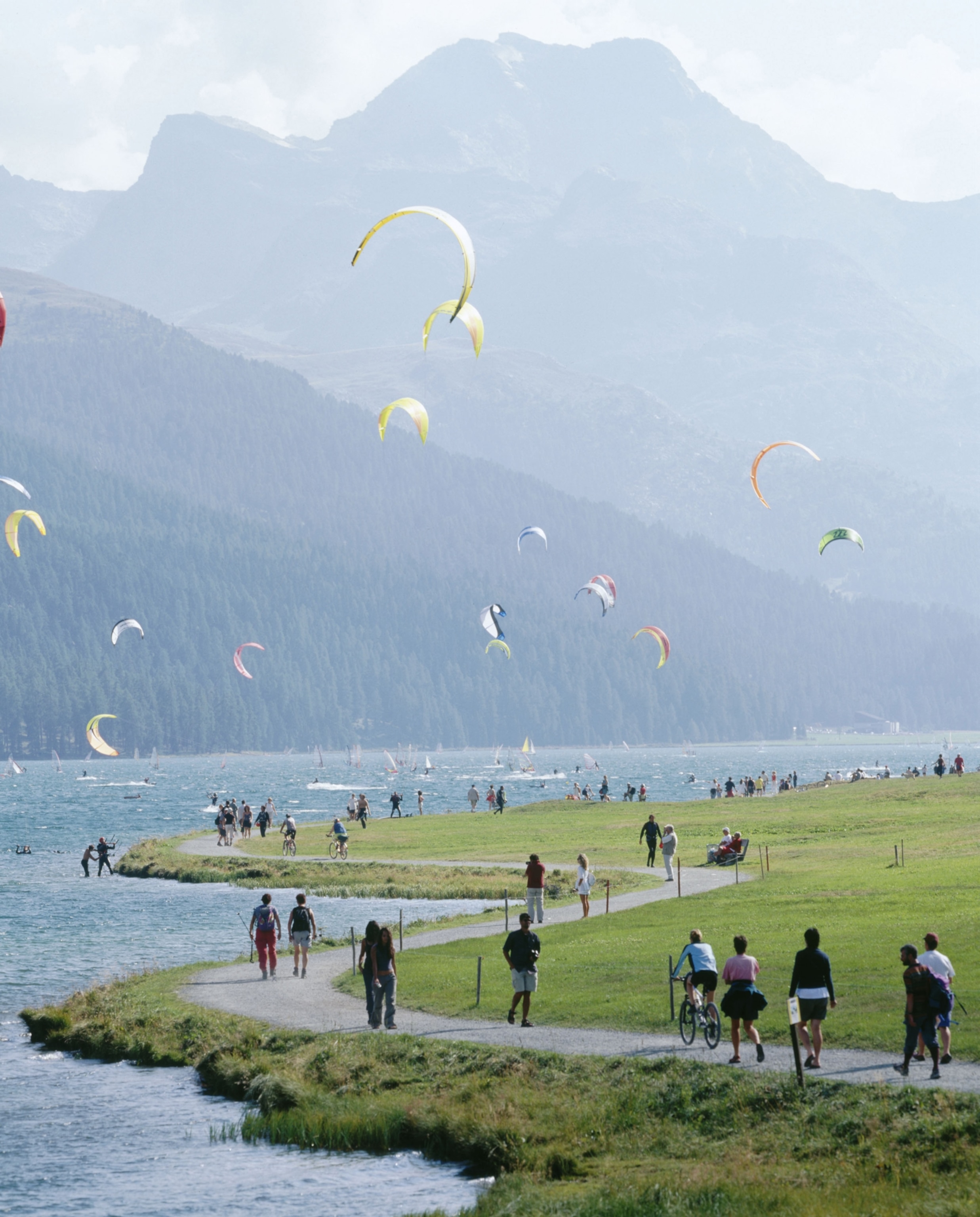Kite surfing on lake Silvaplanersee in Silvaplana, Switzerland