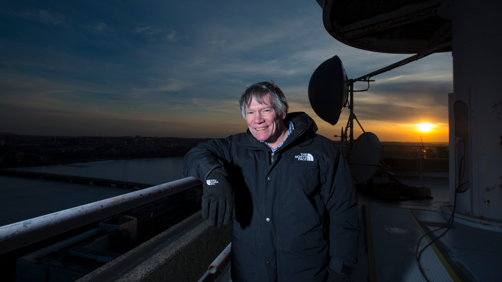 Professor Alan Guth, PhD of the MIT Physics Department with a radio telescope on the roof at MIT on March 14, 2014. Professor Guth was one of the physicists to hypothesize the theory of 