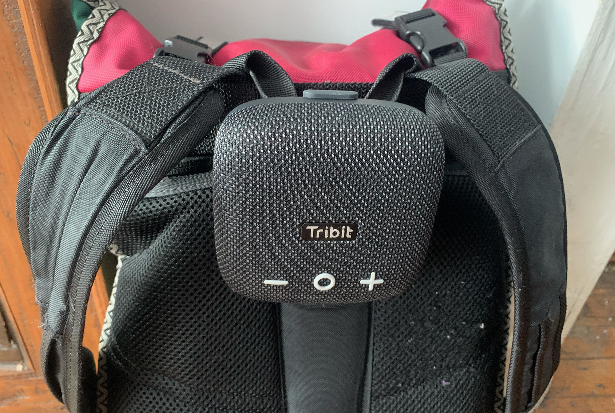 Tribit StormBox Micro 2 attached to a backpack