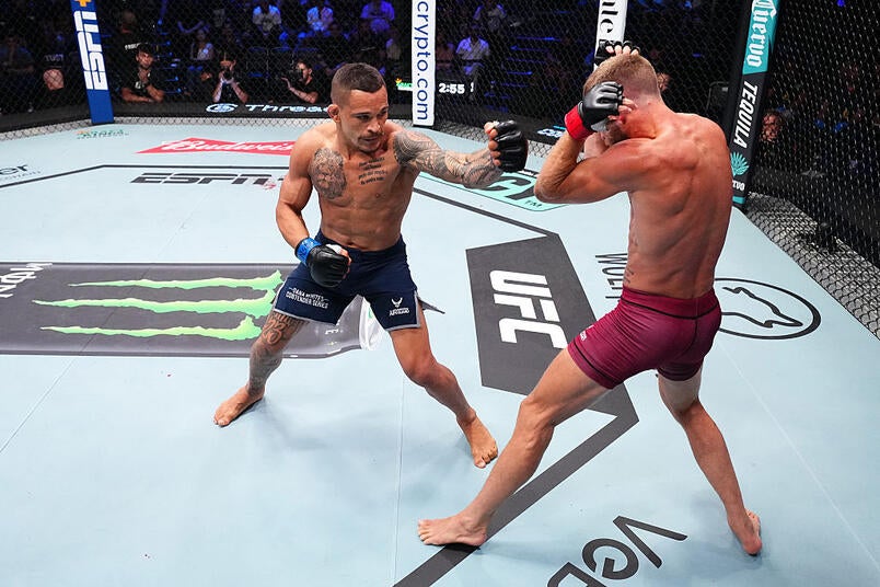 Marcio Barbosa of Brazil punches Damon Wilson in a light heavyweight fight during Dana White's Contender Series season nine, week three at UFC APEX on August 26, 2025 in Las Vegas, Nevada. (Photo by Chris Unger/Zuffa LLC)