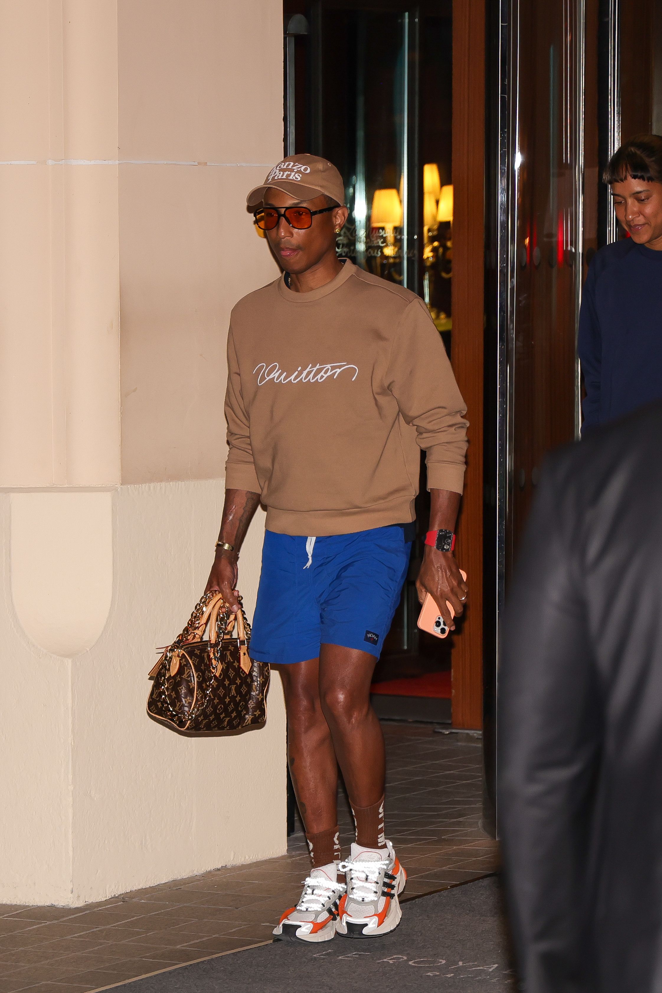 paris, france july 24: pharrell williams is seen leaving a hotel on july 24, 2024 in paris, france. (photo by mega/gc images)