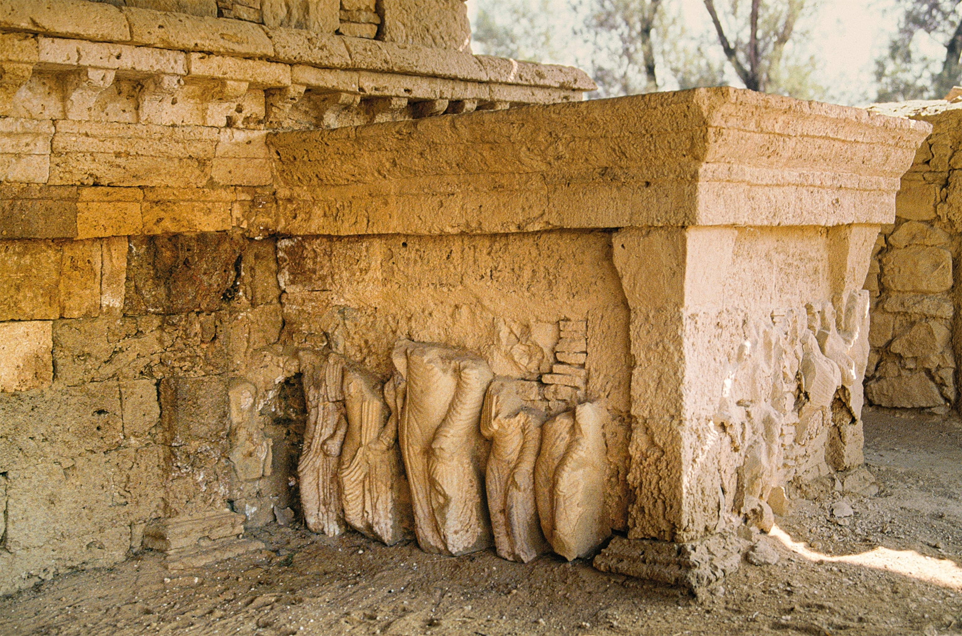 A relief depicting the life of the Buddha near the Great Stupa.
