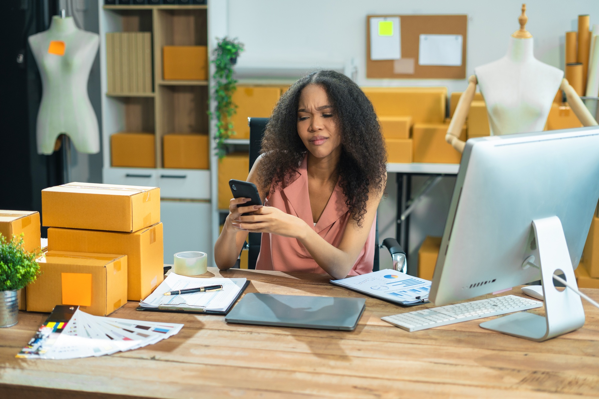 vlogger woman or designers, checking orders from customers