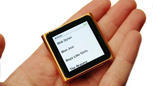An iPod Nano 6th gen in a man's hand