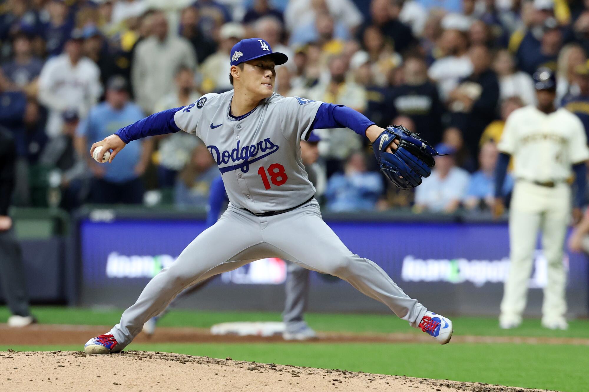 Dodgers pitcher Yoshinobu Yamamoto delivers in the fifth inning of a 5-1 win over the Milwaukee Brewers.