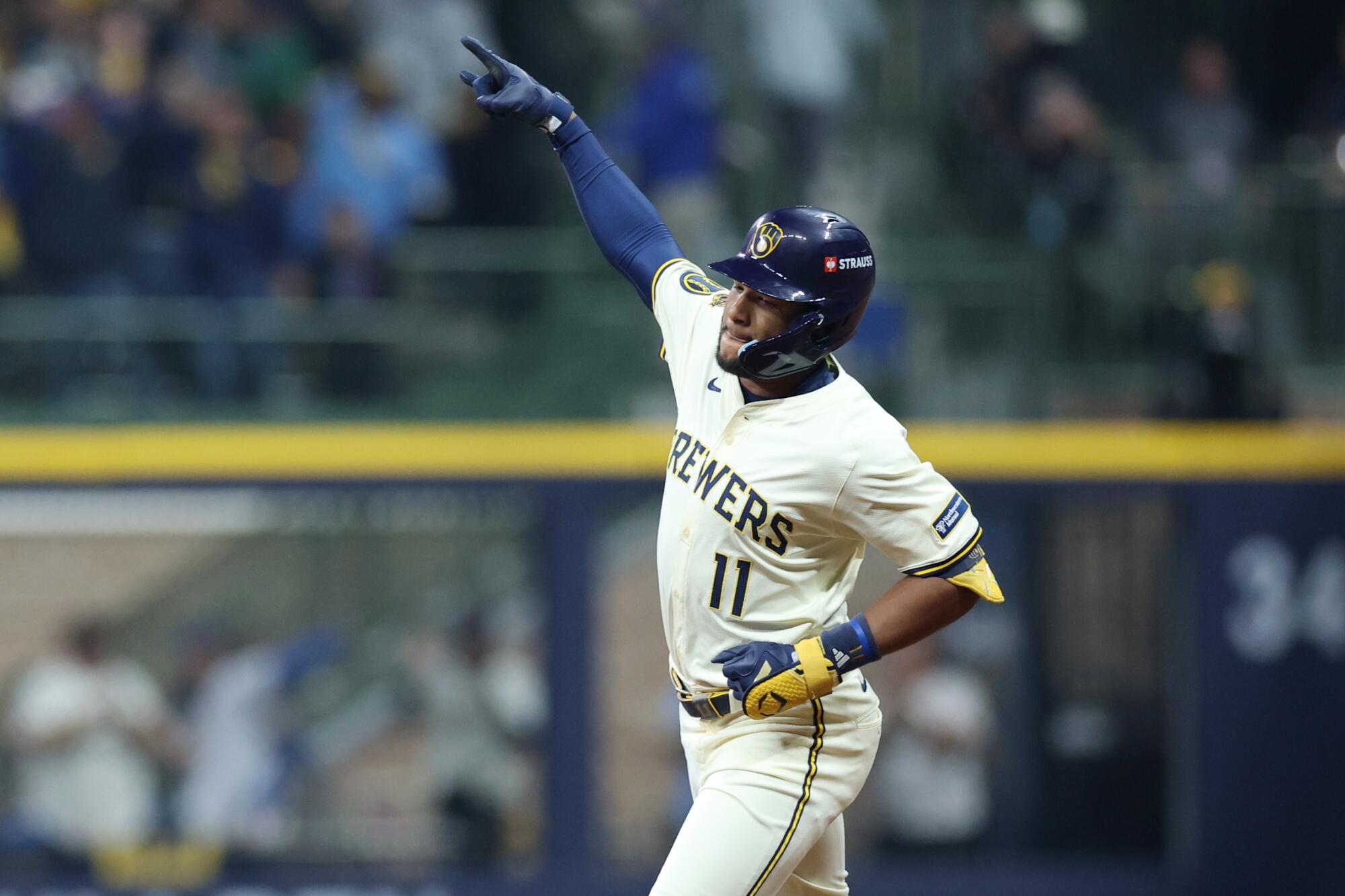 Milwaukee's Jackson Chourio rounds the bases after hitting a leadoff home run.
