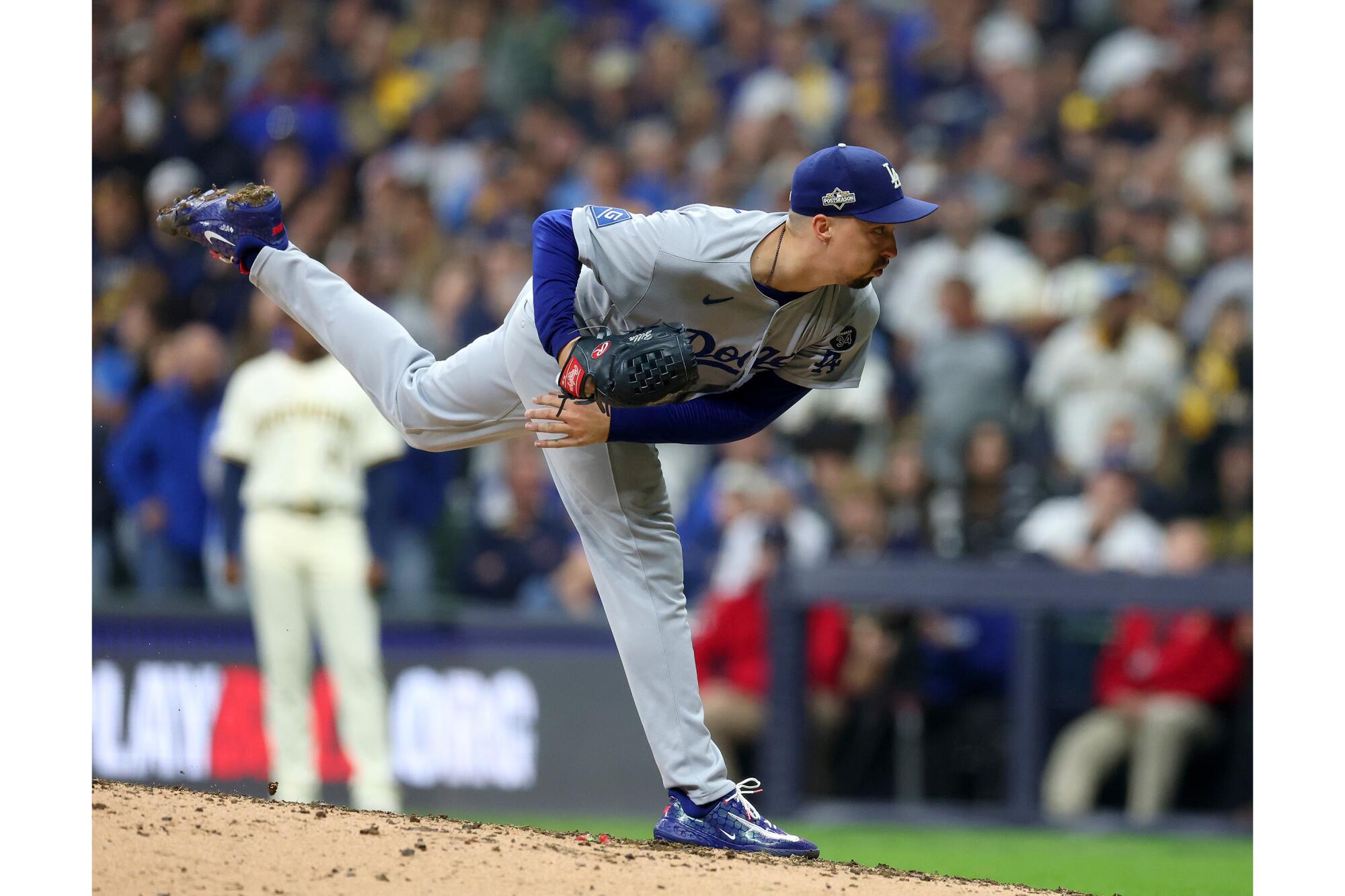 Dodgers pitcher Blake Snell delivers in the eighth inning of a 2-1 win over the Milwaukee Brewers.
